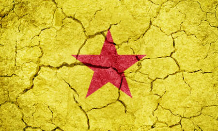 Autonomous Island of MohÃ©li part of the Union of the Comoros flag on dry earth ground texture backgroundの写真素材