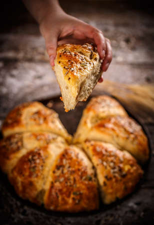 Close up of triangle  bread buns with various seedsの写真素材