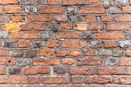 Weathered brick wall surface as a background