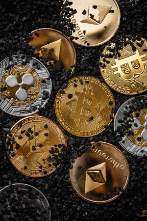 Set of cryptocurrencies with a golden bitcoin on the middleの写真素材