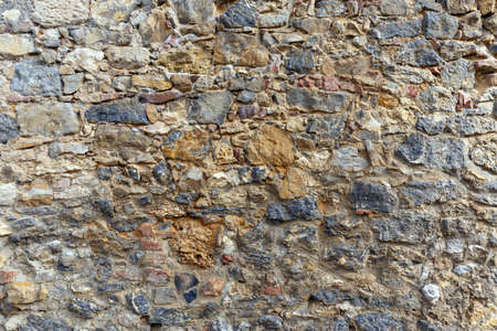 Medieval fortress antique brick and stone wall detail