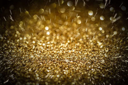 Christmas background. Festive xmas abstract background with bokeh defocused lightsの写真素材