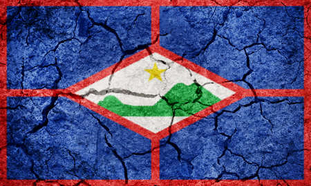 Sint Eustatius, island and special municipality of the Netherlands, flag on dry earth ground texture backgroundの写真素材