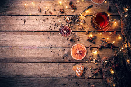 Cup of hot citrus tea. Warm atmosphere, Christmas eveの写真素材