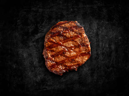 Tenderloin steak on black backgroundの写真素材
