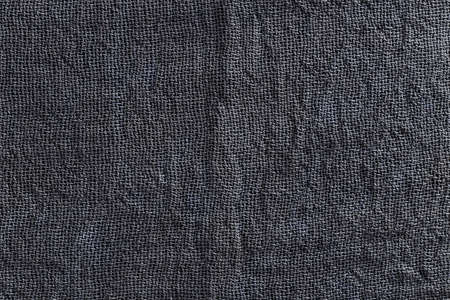 Blue linen fabric texture surface closeup as textile background