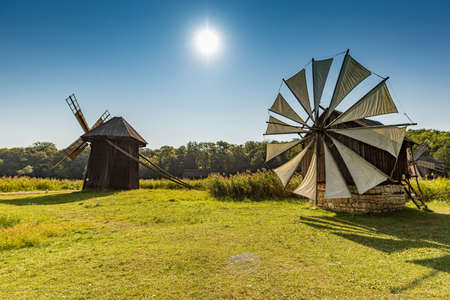 Sunny summer day at the windmill village countryside