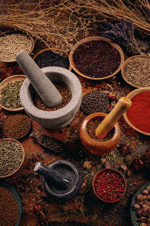 Different kind of spices in mortar, spice conceptの写真素材