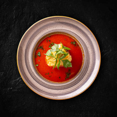 Transylvanian stuffed bell pepper soup seasoned with celery leafの写真素材