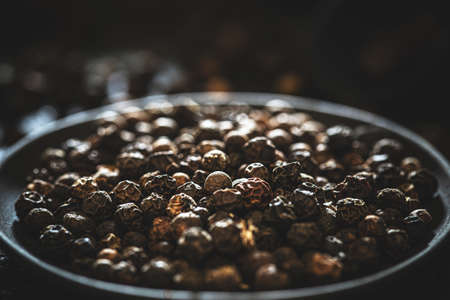 Pile of black peppercornsの写真素材