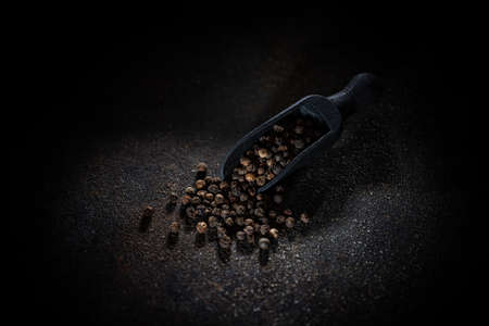 Scattered black pepperの写真素材