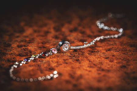 Silver necklace with colorful crystalsの写真素材