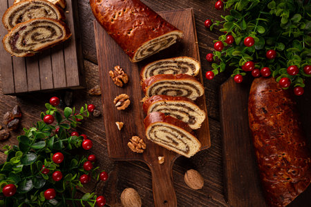 Traditional Hungarian folk cake Christmas or Easter walnut rolls on a wooden cutting board