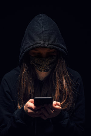 Hooded cyber crime hackerの写真素材