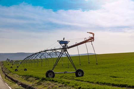 Irrigation system ready to use. Watering system in the field.の写真素材
