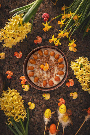 Easter dessert concept, carrot cake with Easter decoration, top view