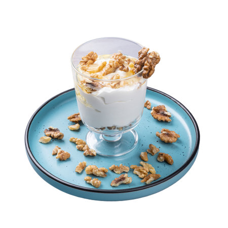 Yoghurt with honey and nuts, restaurant sweet breakfast menu conceptの写真素材