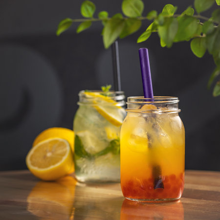 Healthy fruit and berry drinks. Summer cocktails in jarの写真素材