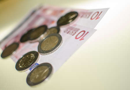 detail of euro coins and notesの写真素材