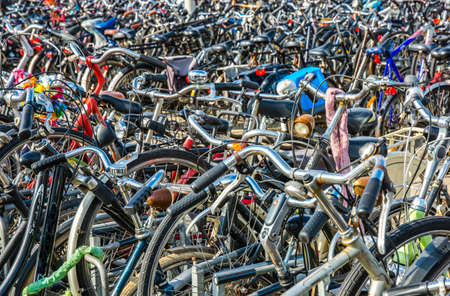 Many bicycle in a parking area in Amsterdam