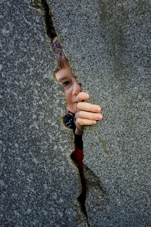 Shy glimpse through a gap