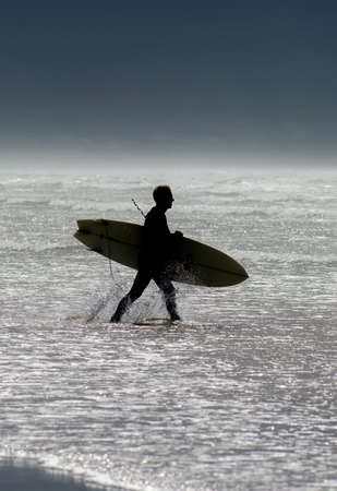 Surfer Entering Water