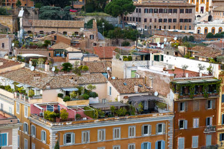 Houses with roof terraces in Rome in Italyの写真素材