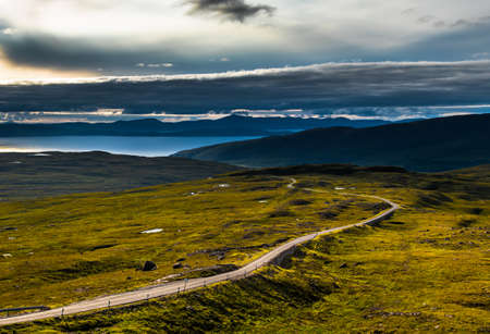 View From Applecross Pass To Scenic Landscape With Curvy Single Track Road And The Isle Of Skye In Scotlandの写真素材