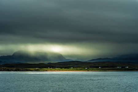 Remote Settlement Near Gairloch At Fog And Rain Clouds At The Scenic Coast Of Scotland