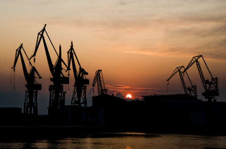 High Cranes At Sunset In Harbor Docks Of Pula Croatiaの写真素材