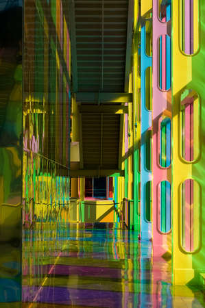 building hall colored by sunlight passing through tinted windowsの写真素材