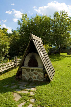 old bread oven outside of an ancient millの写真素材