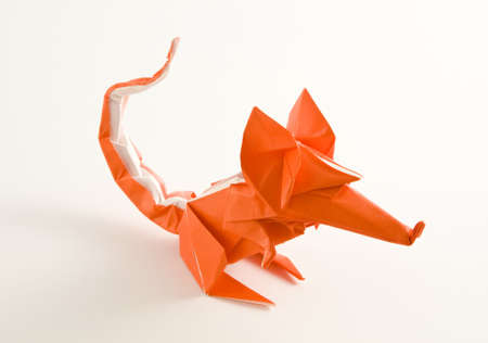 a close shot of an origami mouse isolated on whiteの写真素材