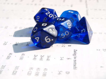 Bones of the RPGs on the table from the textbook の写真素材