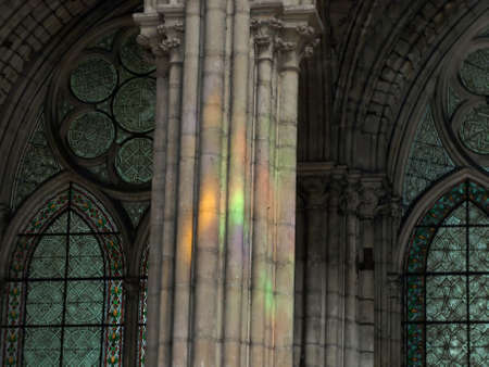 Rainbow on gothic column in Saint Dennisの写真素材