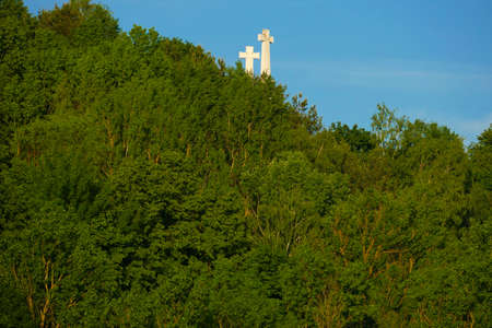 White crosses - one of the distinctive features of Vilnius's landscape - a UNESCO World Heritage Site. This is a visible point from afar and diverse places in the capital of Lithuania. There are many tourists including Poles.の写真素材