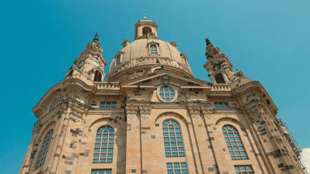 Frauenkirche Dresden - Baroque church with a characteristic dome on the background of the blue sky. Rebuilt from ruins after the destruction of the war.の写真素材
