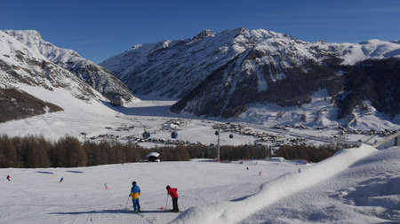 Livigno - popular ski resort at sunny dayの写真素材