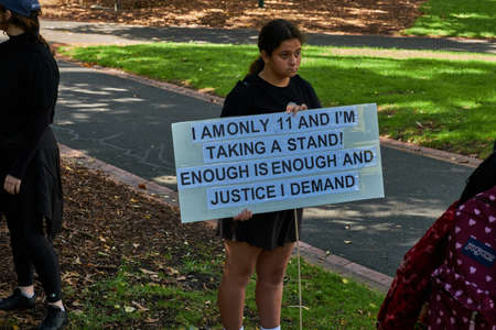 Melbourne Victoria, Australia.
03-15-2021. March 4 Justice Rally At Treasury Gardens. Near Victorian Parliamentのeditorial素材
