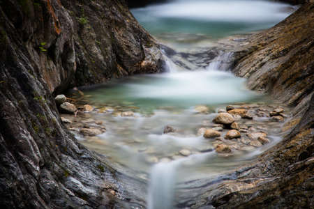 waterfalls in a swiss gorgeの写真素材