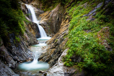 waterfalls in a swiss gorgeの写真素材