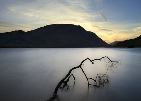 Crummock Water looking towards Mellbreak at sunset, horizontalの写真素材