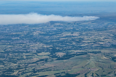 Aerial view of column of smoke from wild fire on Saddleworth Moor Lancashire Englandの写真素材