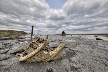 Black Nab, Saltwick Nab and shipwreck of the Admiral von Tromp near Whitbyの写真素材