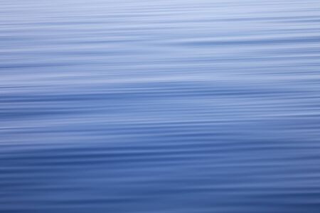 abstract background created from blurred waves on water