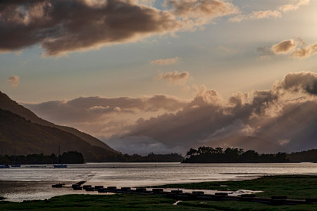 looking west along loch leven to ballachulish from glencoe village at sunsetの写真素材