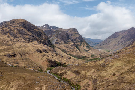the three sisters of glencoe elevated view towards loch achtriochtan in the distanceの写真素材
