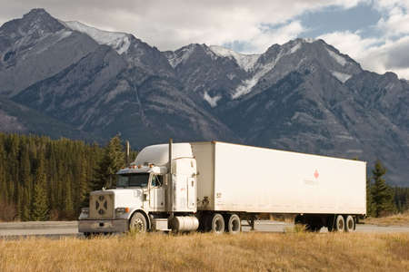 a truck stops in a rest area in the Canadian Rockiesの写真素材