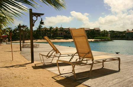 sun loungers at Port St Charles, Barbadosの写真素材