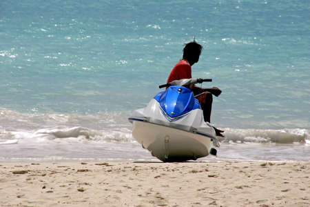 a jet ski rider taking a rest